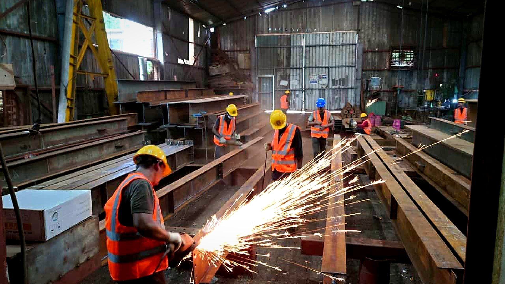 Steel members being cut and welded in the ISSBC fabrication workshop